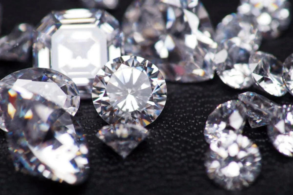 close shoot group sparkling diamonds shoot black leather background