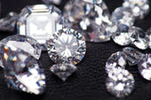 close shoot group sparkling diamonds shoot black leather background